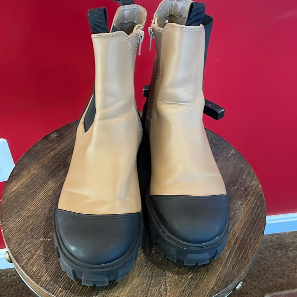 Beige and black chunky boots